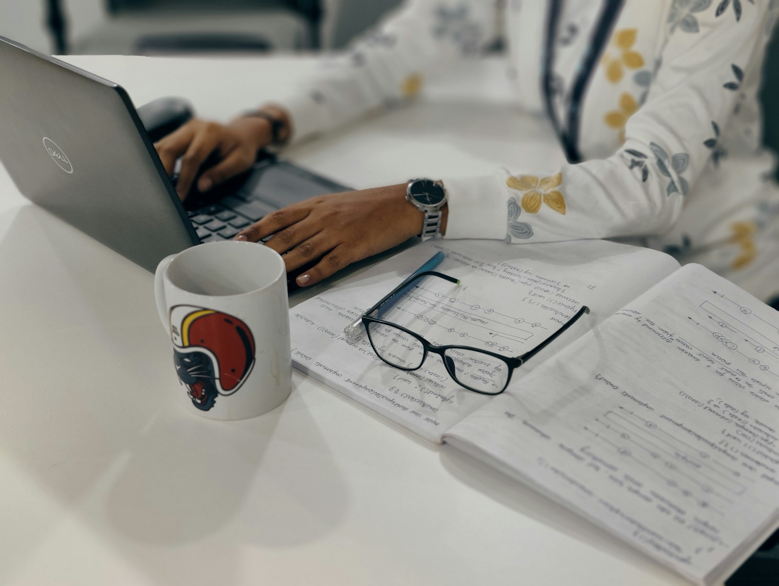 Developer working at a desk with a laptop